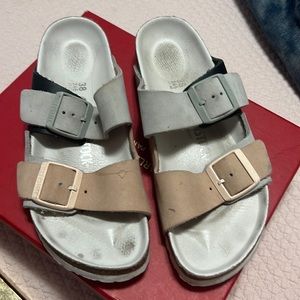 White gray and taupe Birkenstocks size 38 Warren a few times.